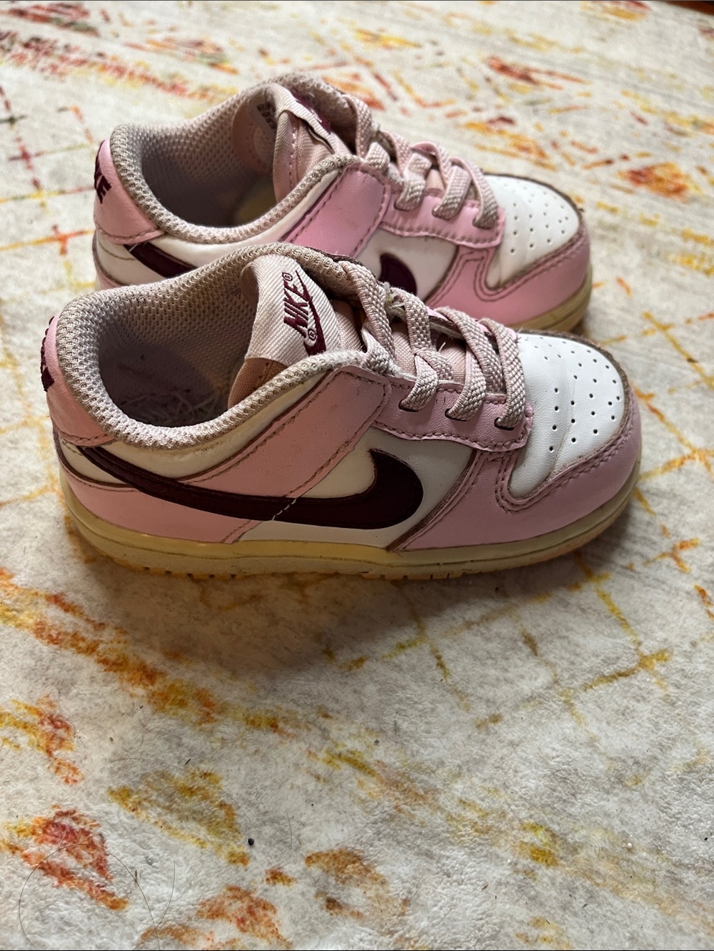 Nike Kids Pink and White Low-Top Sneakers with Dark Swoosh